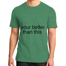 District T-Shirt (on man) Heather green unorthodoxy